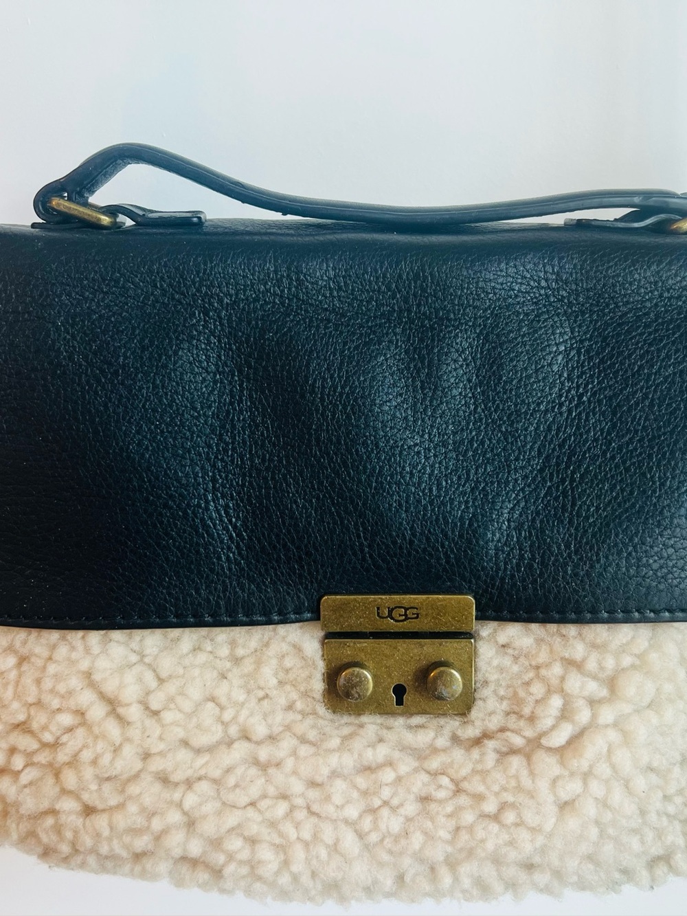 UGG Black Leather and Cream Shearling Crossbody with Brass Hardware